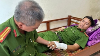 Một công an bị thương khi ngăn chặn nhóm người mang hung khí đi chém nhau