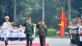 នាយឧត្តមសេនីយ៍ Luong Cuong អញ្ជើញជាអធិបតីក្នុងពិធីស្វាគមន៍ប្រធាននាយកដ្ឋាននយោបាយទូទៅនៃកងទ័ពប្រជាជនឡាវ។