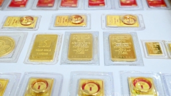 Vàng thế giới bật tăng trở lại, vàng miếng SJC giảm giá chiều mua