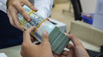 Khách vay vốn vẫn bị ép mua bảo hiểm, Ngân hàng Nhà nước nói gì?