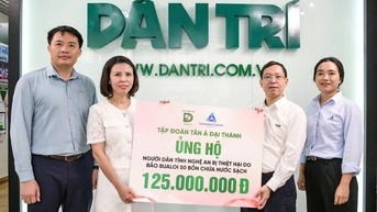 탄 아 다이 탄, 응에안 홍수 피해자들과 손잡다