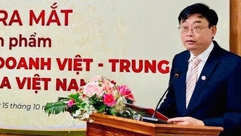 សម្ពោធ​ការ​បោះពុម្ព​ជា​ពីរ​ភាសា​ "ការ​តភ្ជាប់​ពាណិជ្ជកម្ម​វៀត​ណាម​-ចិន​៖ ភាព​ល្អិតល្អន់​របស់​វៀតណាម"