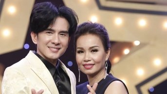 Đan Trường, Cẩm Ly nắm tay song ca "Chim trắng mồ côi" dưới cơn mưa Hà Nội