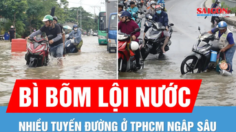 Triều cường vượt báo động 3, người dân TPHCM bì bõm đẩy xe chết máy