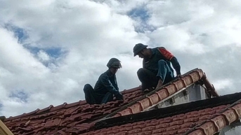 Quân đội, công an giúp dân khắc phục hậu quả bão số 13