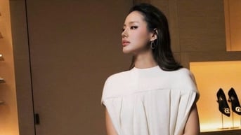Diện mạo thêm ấn tượng khi kết hợp với bốt cao cổ