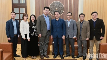 Báo Nhân Dân và Tân Hoa Xã hợp tác, trao đổi kinh nghiệm trong công tác thông tin, tuyên truyền
