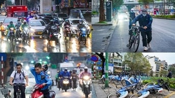Không khí lạnh tràn về, người Hà Nội chật vật di chuyển trong gió mạnh