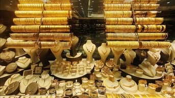 Nhu cầu trú ẩn an toàn giữ nhịp tăng cho vàng