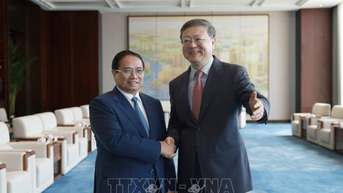 Thủ tướng Phạm Minh Chính gặp Bí thư Thành ủy Thượng Hải Trần Cát Ninh