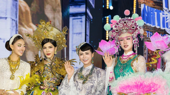 អ្នកច្នៃម៉ូដ Thanh Huong Bui ចាប់អារម្មណ៍នឹងសំលៀកបំពាក់ប្រពៃណីពេលអង្គុយកៅអីក្តៅនៃ Miss Grand Vietnam
