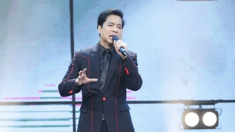 ង៉ុក សឺន ភ័យ​ព្រួយ​ពេល​ច្រៀង​ក្នុង​ការ​ប្រគុំ​តន្ត្រី​លើក​តម្កើង វ៉ាន់ កាវ និង ង៉ោ ធុយមៀន។