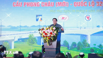 នាយករដ្ឋមន្ត្រី៖ ស្ពាន Phong Chau ថ្មី គឺជាស្ពានដែលព្យាបាលរបួស និងផ្តល់ទំនុកចិត្តឡើងវិញ។
