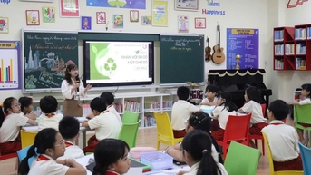 Kota Ho Chi Minh: 100% guru di sekolah-sekolah unggulan harus mampu berkomunikasi dalam bahasa Inggris.
