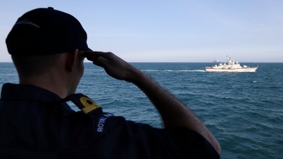 Image of British patrol ship practicing with Vietnamese Navy soldiers