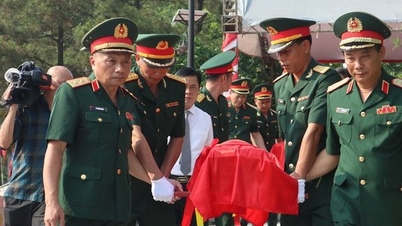Truy điệu, an táng 96 hài cốt liệt sĩ được quy tập tại Lào