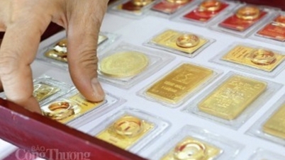 Vàng thế giới giảm nhẹ khi đồng USD kìm hãm đà tăng