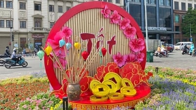 Parks und Kreisverkehre in Ho-Chi-Minh-Stadt sind voller Blumen, um das Jahr des Drachen zu begrüßen.