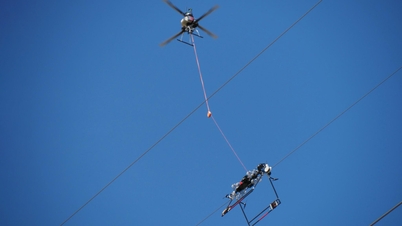Drones combine with wire-handling robots to save birds