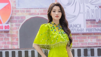 นางงามท่องเที่ยวเวียดนาม Pham Thi Ngoc Quynh โดดเด่นใต้หอธงฮานอย