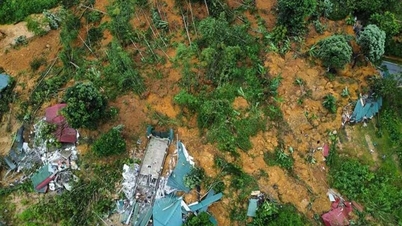 Evacuating people at night from landslide area in Ha Giang