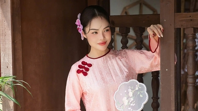 Ao Dai ផ្សំជាមួយផ្កា 'ទាន់សម័យ' ដោតជាប់នឹងសក់ ជួយ Duong Cam Lynh 'hack អាយុរបស់នាង'