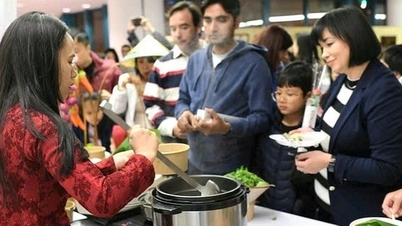 International visitors line up to enjoy Vietnamese pho