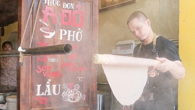 Hanoi Pho restaurant with billowing smoke, serving rare red pho noodles