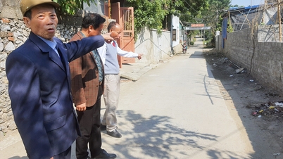 Hanoi people donate land to build roads