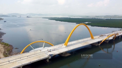 ស្ងើចសរសើរស្ពានទីពីរឆ្លងកាត់ឆ្នេរសមុទ្រ Cua Luc ជិតរួចរាល់ហើយ។