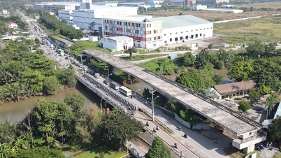 Cầu ở cửa ngõ TP HCM thi công lại sau 4 năm ngưng trệ