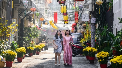 វិថីនានាក្នុងទីក្រុងហូជីមិញមានសន្តិភាព និងកំណាព្យនៅថ្ងៃដំបូងនៃបុណ្យតេត