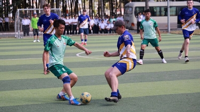 Image of HMS Spey crew playing football in Vietnam