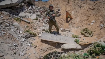 Hamas says guards killed an Israeli hostage, wounded two female prisoners