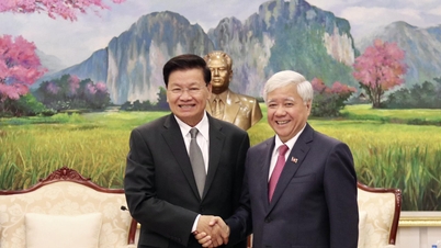 Tổng Bí thư Lào tiếp Chủ tịch MTTQ Việt Nam Đỗ Văn Chiến