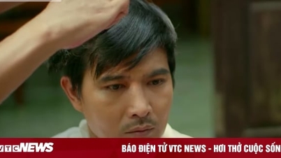 Mr. Toai painfully cut Cong's hair.