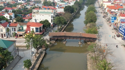 Visit the hundred-year-old bridge across the An River