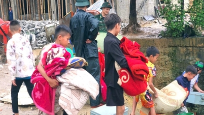 Large block of earth and rock slides down to dormitory, threatening hundreds of students