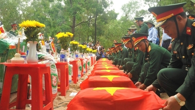 Touching images at the memorial service and burial of 12 martyrs who died in Laos