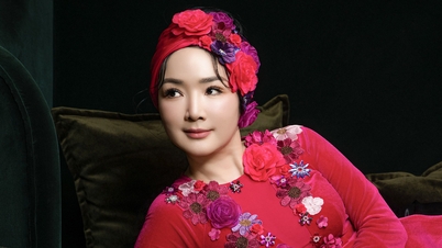 Giang My ពាក់អាវ ao dai "Sac hoa mau nho" ដោយ Vo Viet Chung