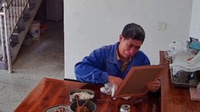 Secretly watching the camera from afar, the girl burst into tears because of her stepfather's actions.