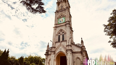 ព្រះវិហារបុរាណចំណាស់មួយរយឆ្នាំ នៅលើទំនប់ទឹកនៃទន្លេ Thai Binh