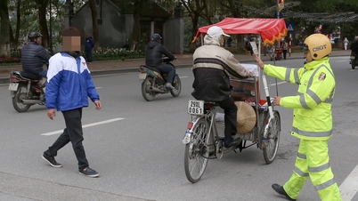 คนเดินถนนฝ่าไฟแดงปรับสูงสุด 250,000 ดอง