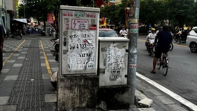 Classified ads covered the technical cabinets on Lach Tray street