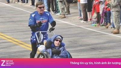 車椅子に乗った子供を押して走る父親の壮大なマラソンの旅
