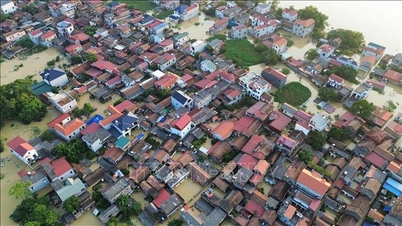 Bac Ninh: Noční práce na ochraně bezpečnosti hráze ve vesnici Thuan v obci My Thai