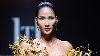 A supermodelo Hoang Thuy cobriu seu corpo com mais de 100 folhas de ouro, se apresentando como vedette em Xangai