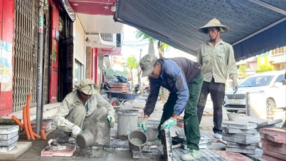 Construction « Sprint » du trottoir, rue Le Loi