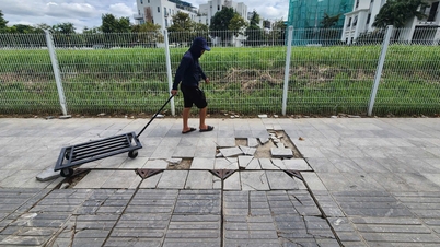 Die Bürgersteige vieler Straßen in Hanoi sind in einem schlechten Zustand und halten Fußgänger gefangen.