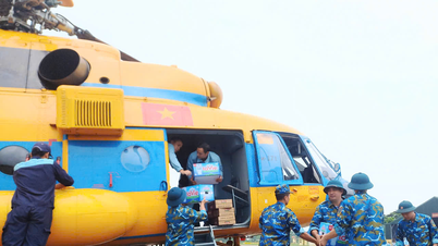 3 helikopter dari Resimen Angkatan Udara 916 siap lepas landas untuk melakukan penyelamatan di Vietnam Tengah